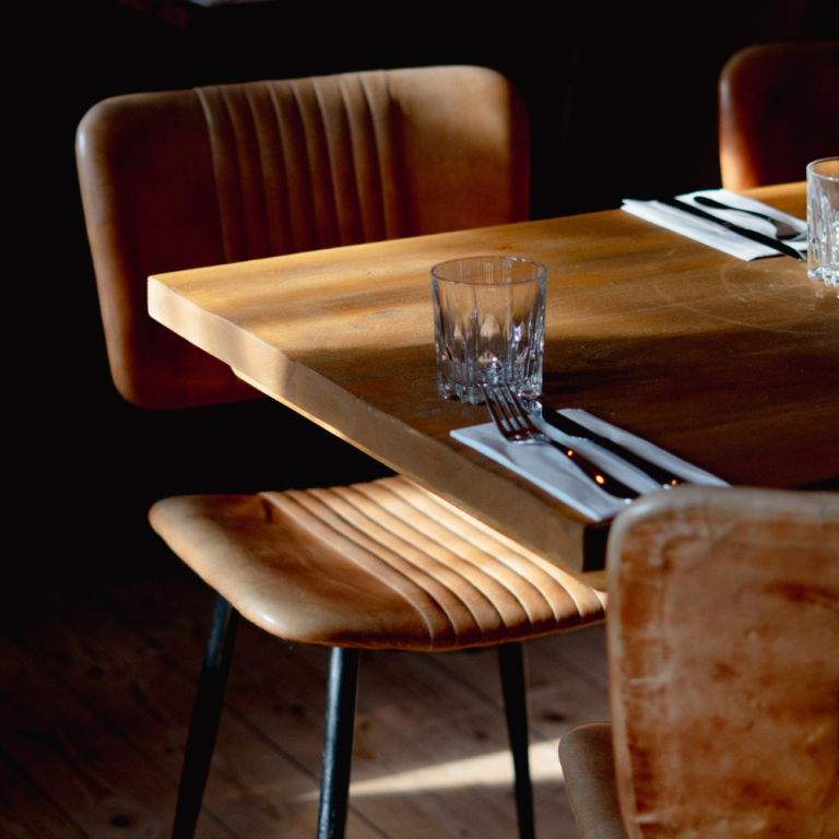 Comfortable pub desking setup at The Baker’s Arms, ideal for quiet remote work in a relaxed Cotswold setting.