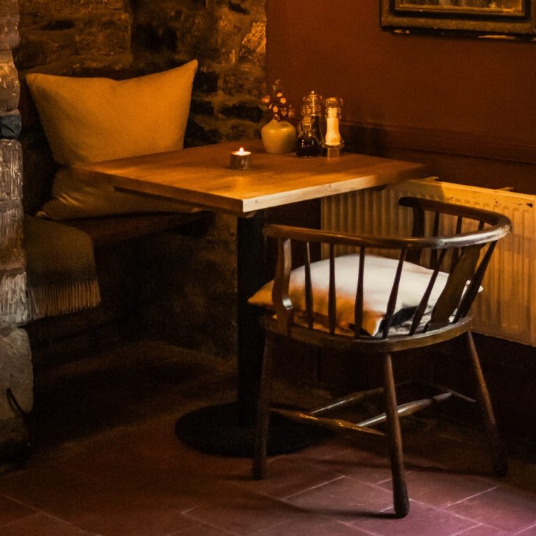 Pub desking nook inside The Baker’s Arms, a cosy Cotswold pub workspace with rustic charm.